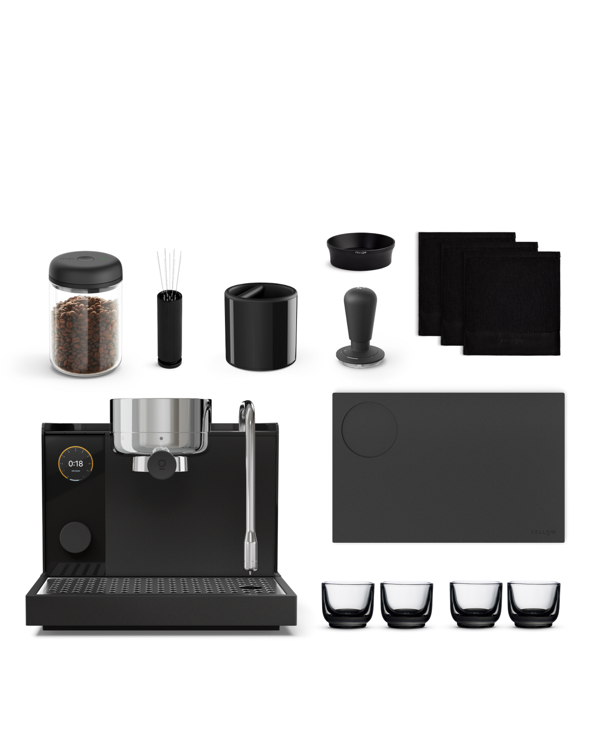 Fellow Series 1 + Accessories Kit: espresso machine, beans, cups, tamper, and mat.