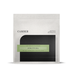 CC Struttura espresso blend, dark chocolate notes, black & green minimalist label.