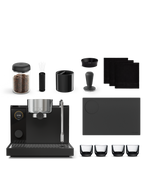Fellow Series 1 + Accessories Kit: espresso machine, beans, cups, tamper, and mat.
