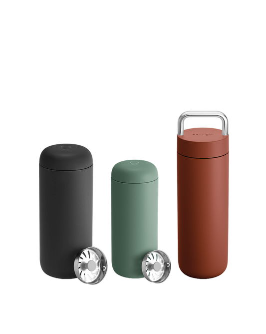 The Fellow Carter Mug Trio: three insulated travel mugs with strainers, ideal for coffee.