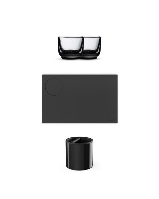 The Fellow Essential Espresso Bundle includes two cups, a knock box, and a tray.