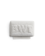 Fellow BWT Bestsave M white rectangular limescale pad with embossed BWT logo.